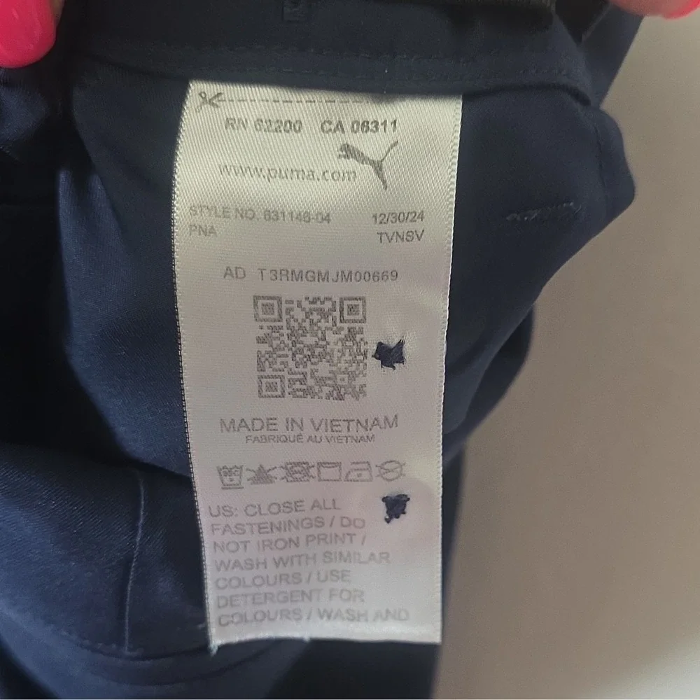 Puma youth boys navy performance shorts. Size large (13-14Y), made in Vietnam.